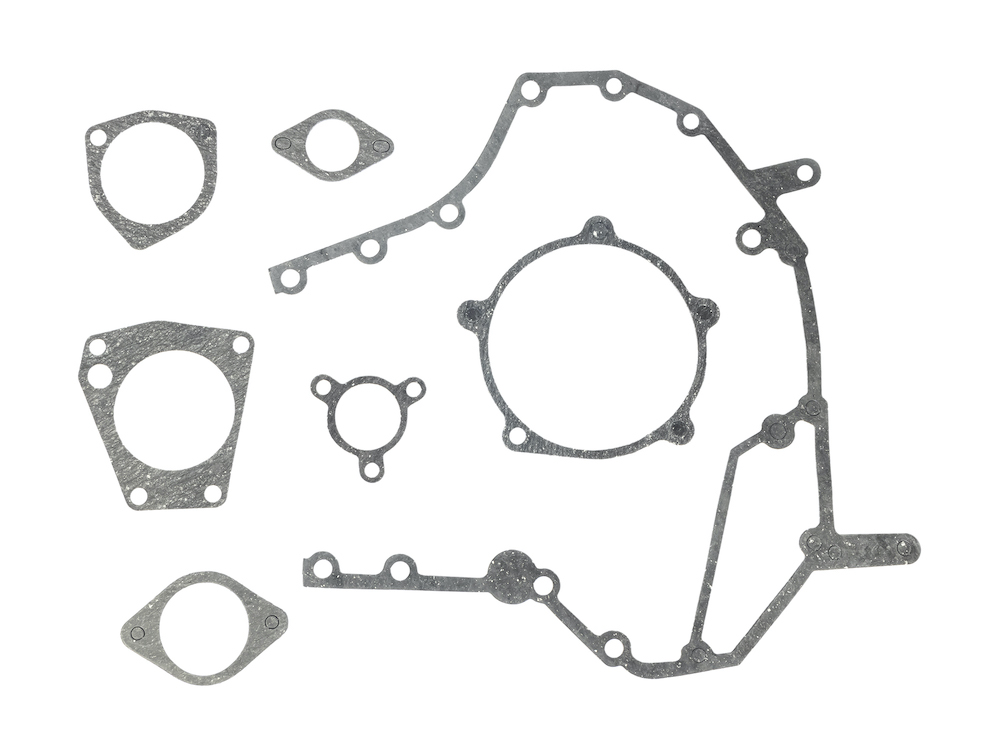 Прокладки картера маховика КАМАЗ (к-т 7 наим.)(паронит 0.6, подложка) (TD) фото 1